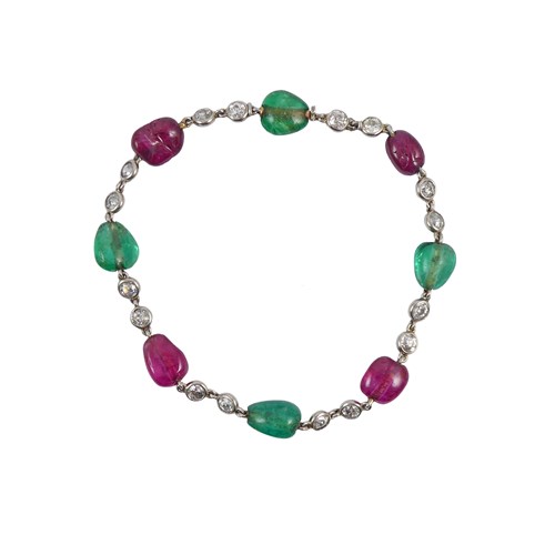 Art Deco ruby and emerald bead and diamond bracelet, c,1920, alternating polished oblong and drop shaped rubies and emeralds,